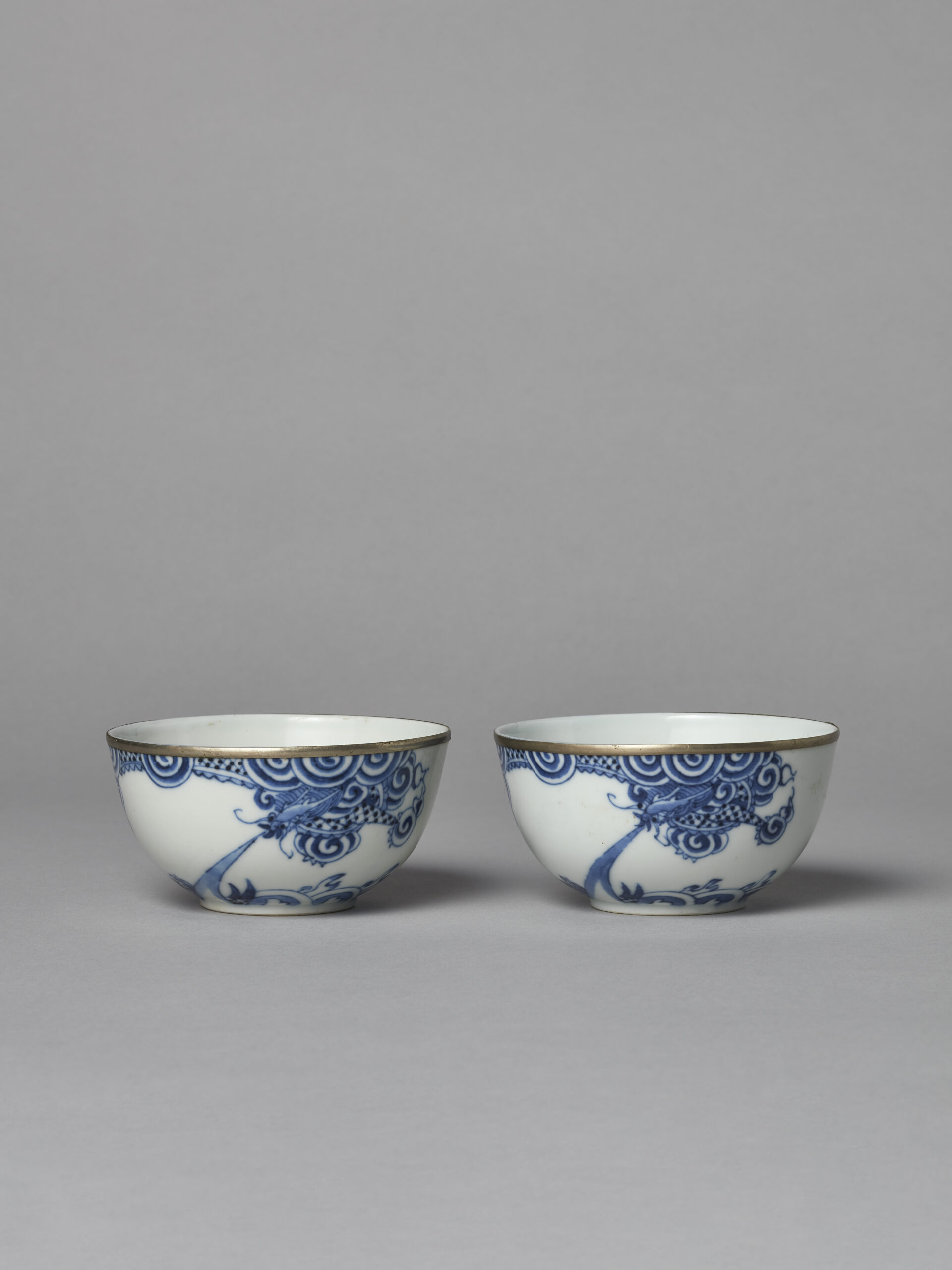 A pair of large 'blue de Hué' dragon bowls (Vietnam, 19th century)
