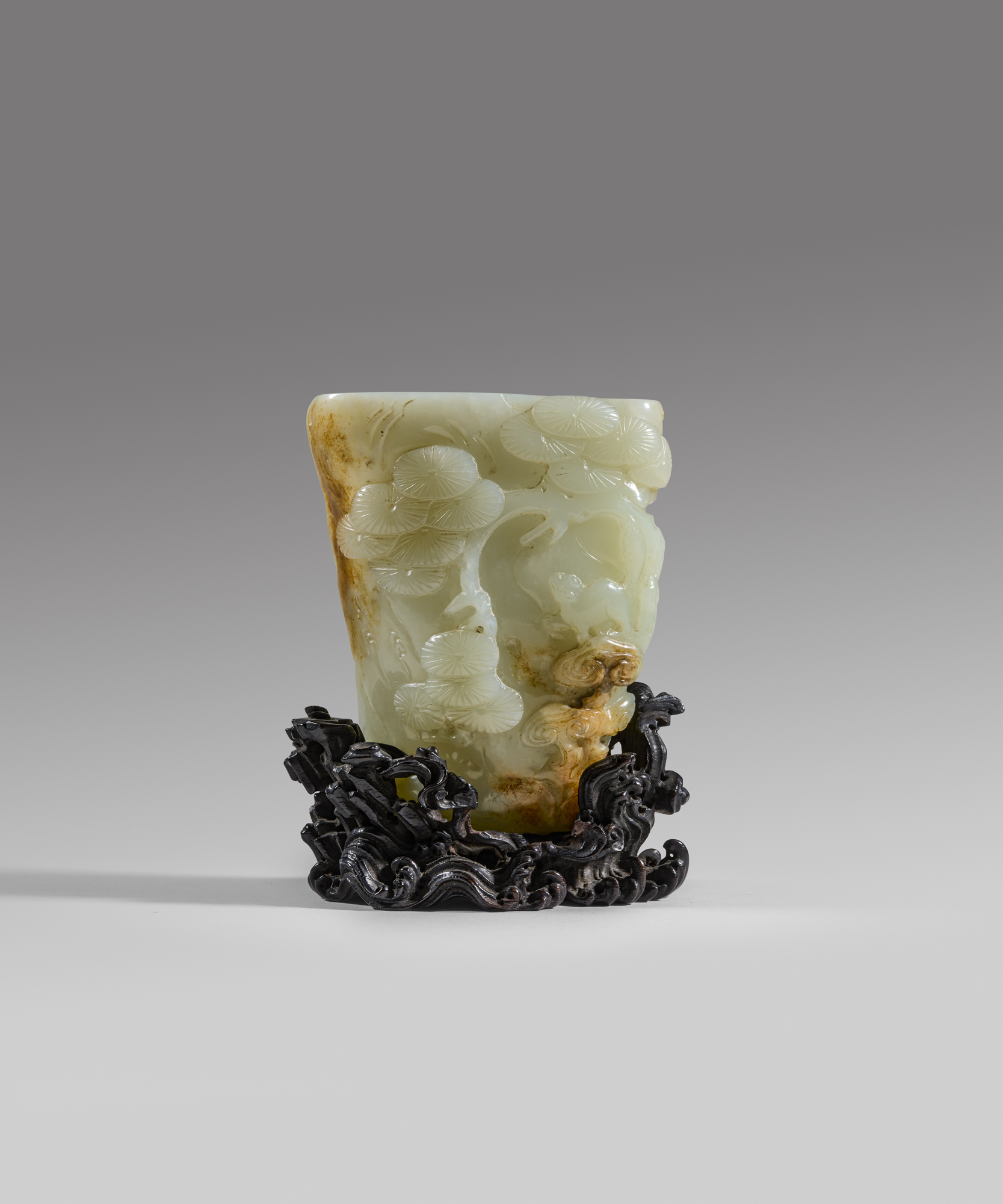 A white and russet jade 'pine' rhyton (17th/18th century)