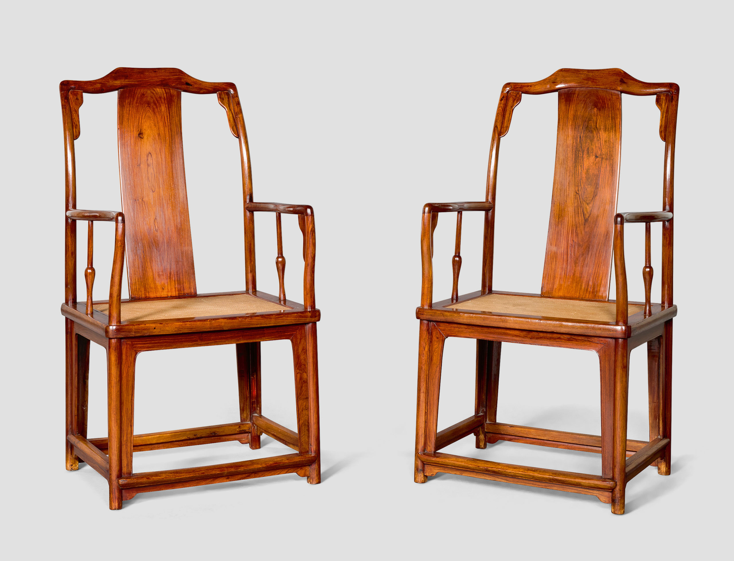 A PAIR OF LARGE HUANGHUALI CONTINUOUS YOKEBACK ARMCHAIRS, NANGUANMAOYI, LATE MING DYNASTY, 120 by 62 by 48 cm A PAIR OF LARGE HUANGHUALI CONTINUOUS YOKEBACK ARMCHAIRS, NANGUANMAOYI, LATE MING DYNASTY, 120 by 62 by 48 cm