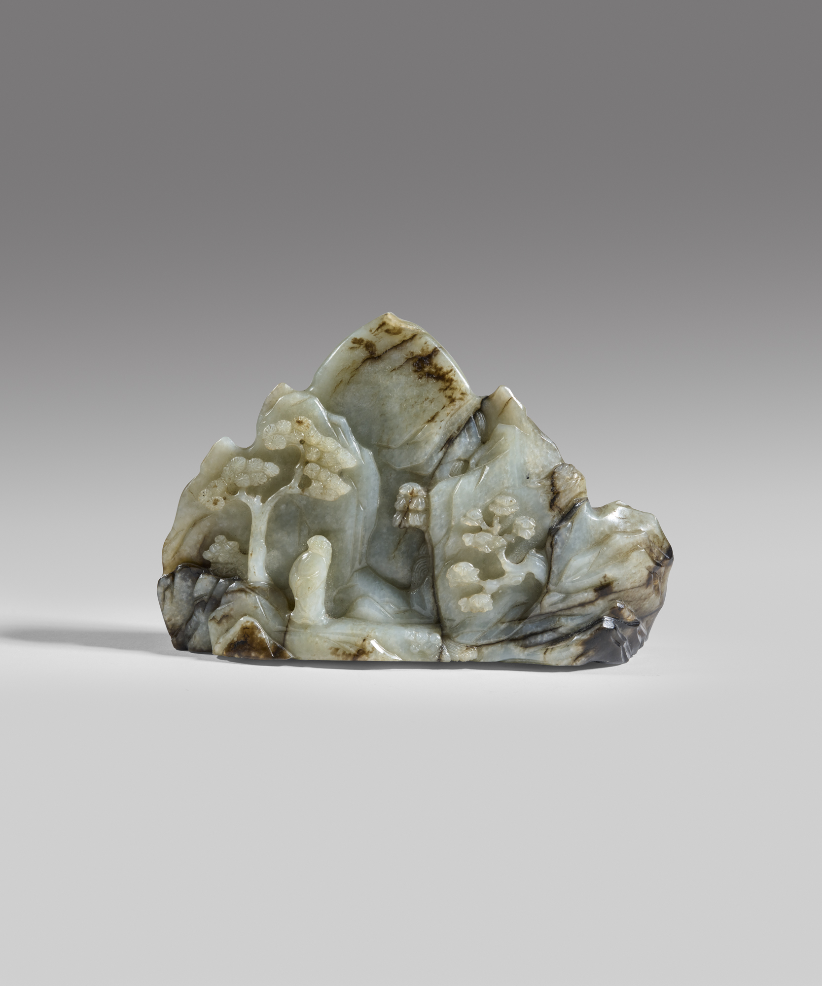 An important imperial inscribed mottled white jade boulder (Qianlong period, 1735-1796)