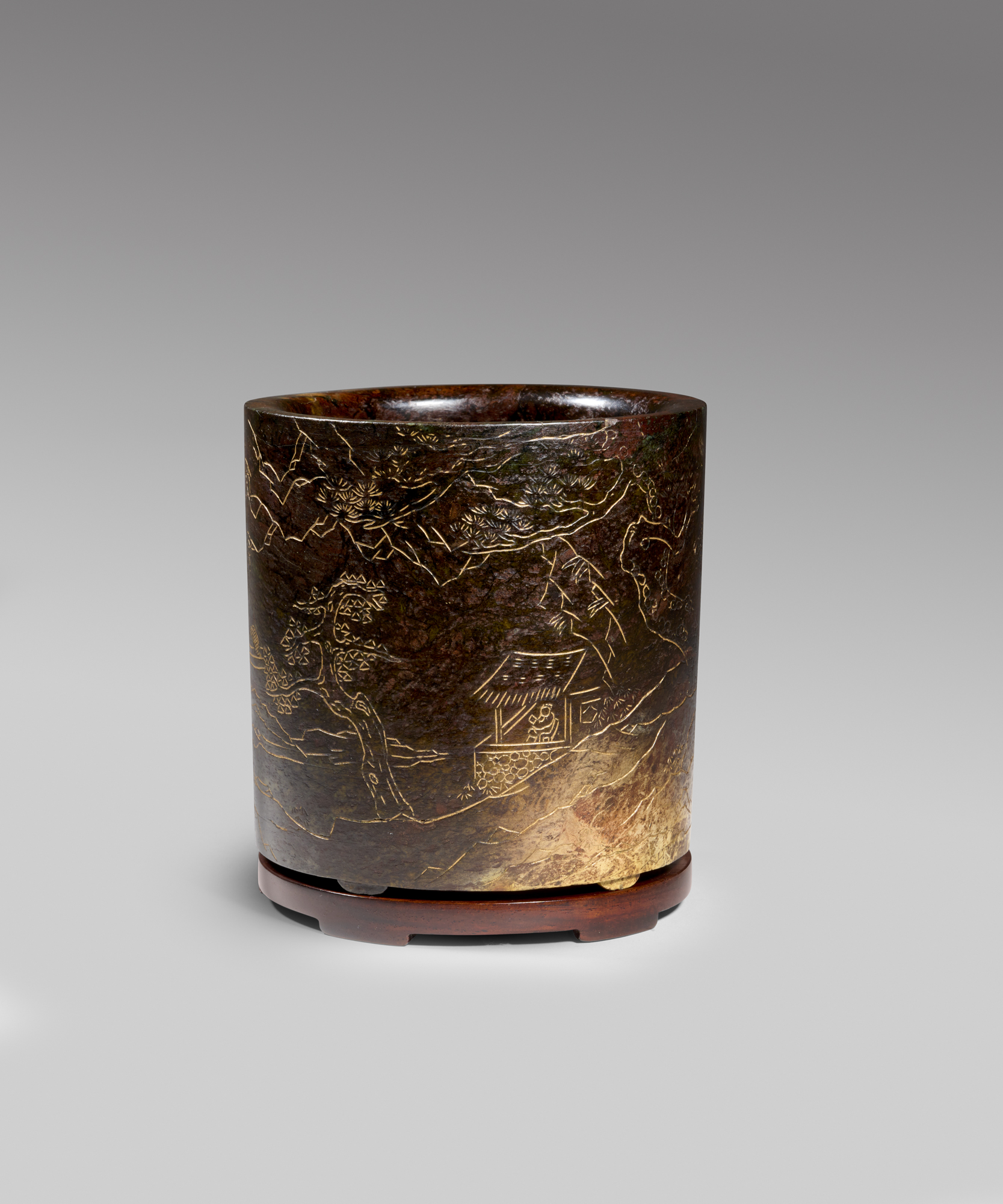 An important incised and gilt burnt jade brush pot (Kangxi period, 1662-1722)