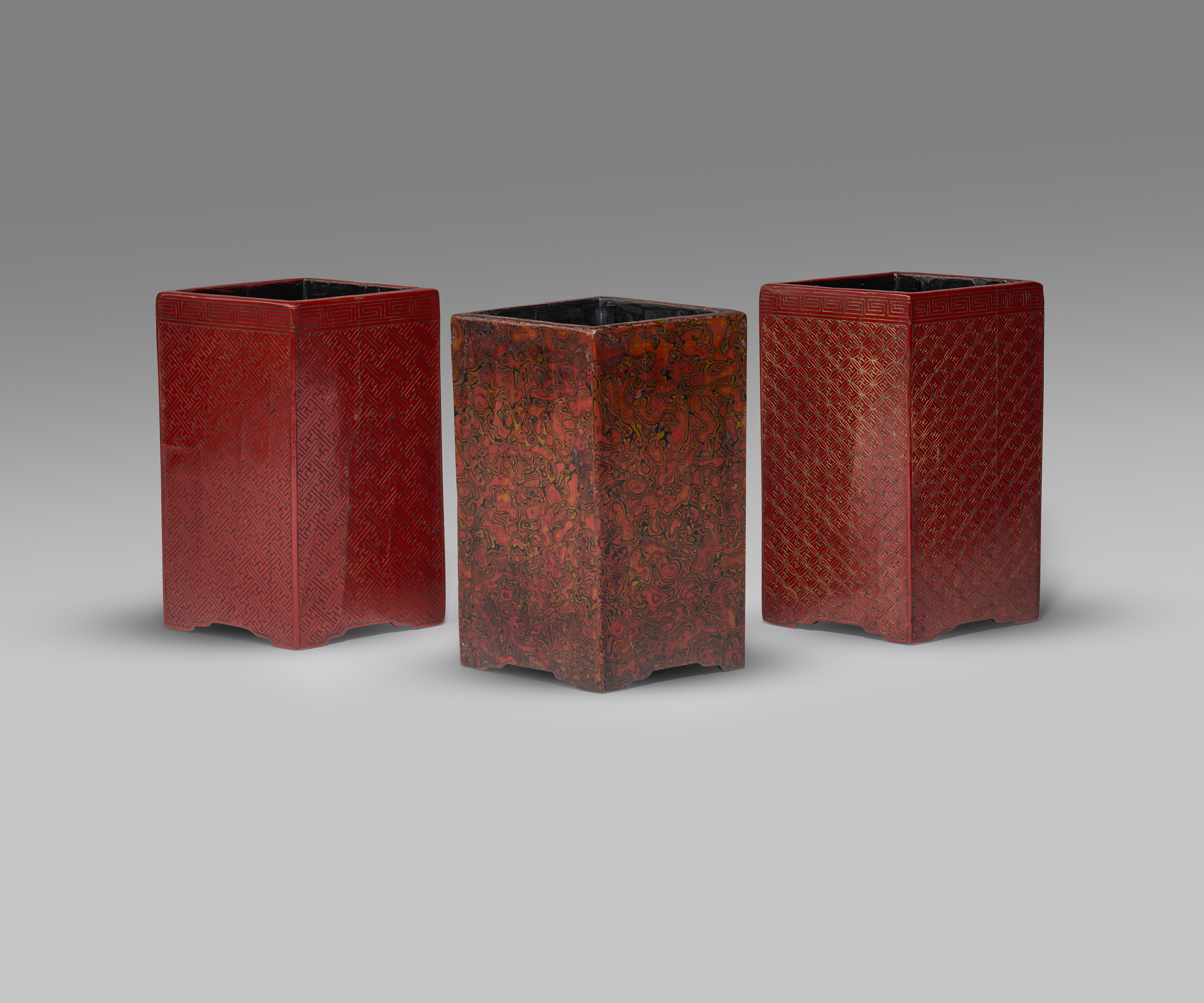 A group of three rhombic or diamond shaped lacquer brush pots (Wanli mark and period, 1573-1619)