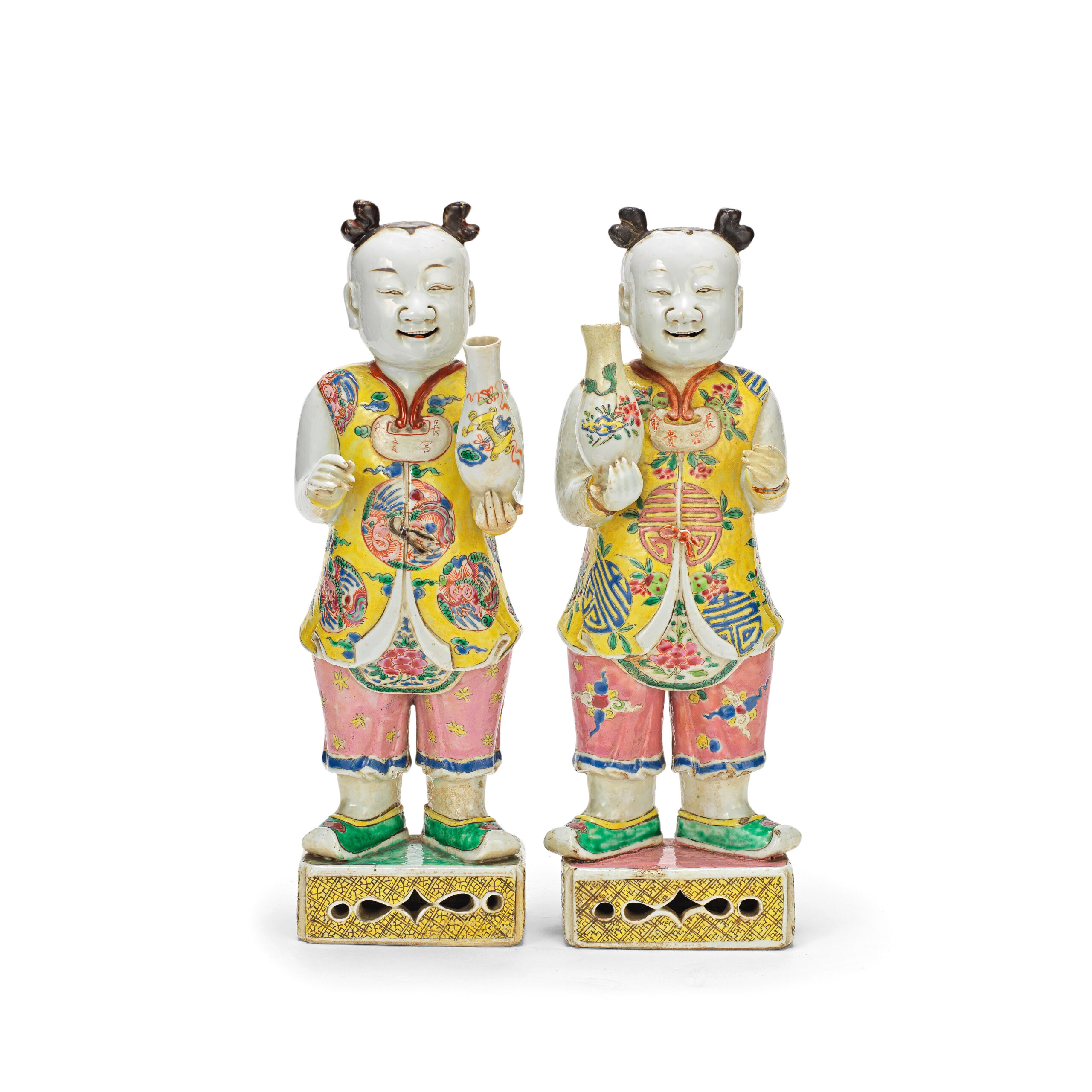 A large pair of famille rose standing boys, Qianlong