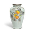 A moriage and cloisonne enamel bird and persimmon vase, by the workshop of Ando Jubei of Nagoya, dated to the 4th year of Showa, corresponding to 1929 and of the period