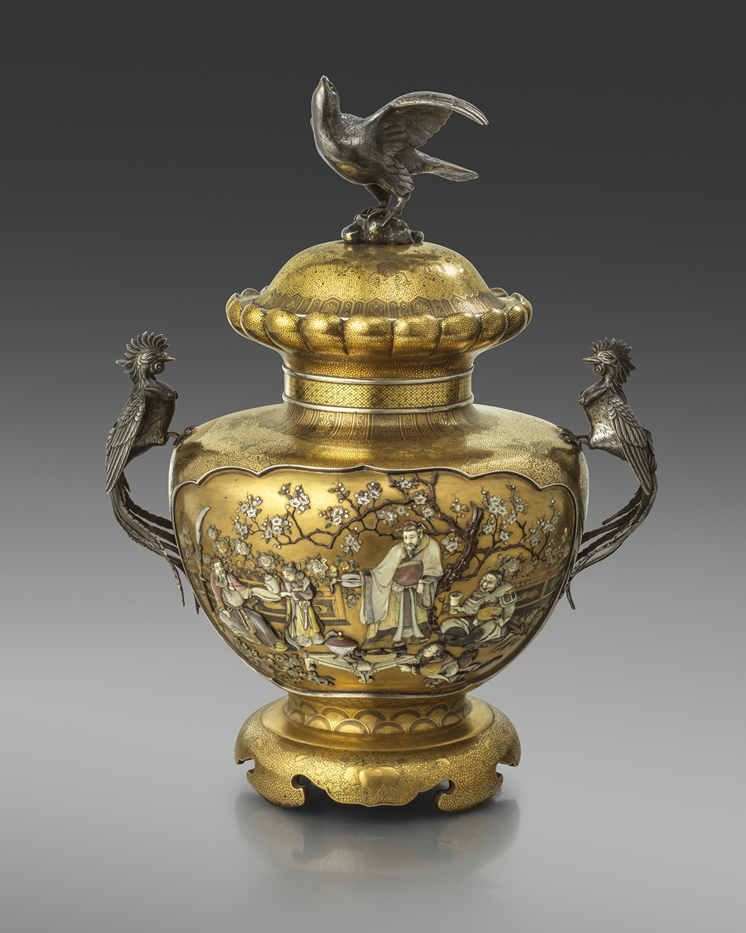 A large Shibayama vase and cover, finely worked with panels of The Three Heroes of Han, applied with silver ho-o handles and surmounted by an eagle finial. Signed on a mother of pearl tablet Harumasa, Meiji Period Circa 1890 A large Shibayama vase and cover, finely worked with panels of The Three Heroes of Han, applied with silver ho-o handles and surmounted by an eagle finial. Signed on a mother of pearl tablet Harumasa, Meiji Period Circa 1890