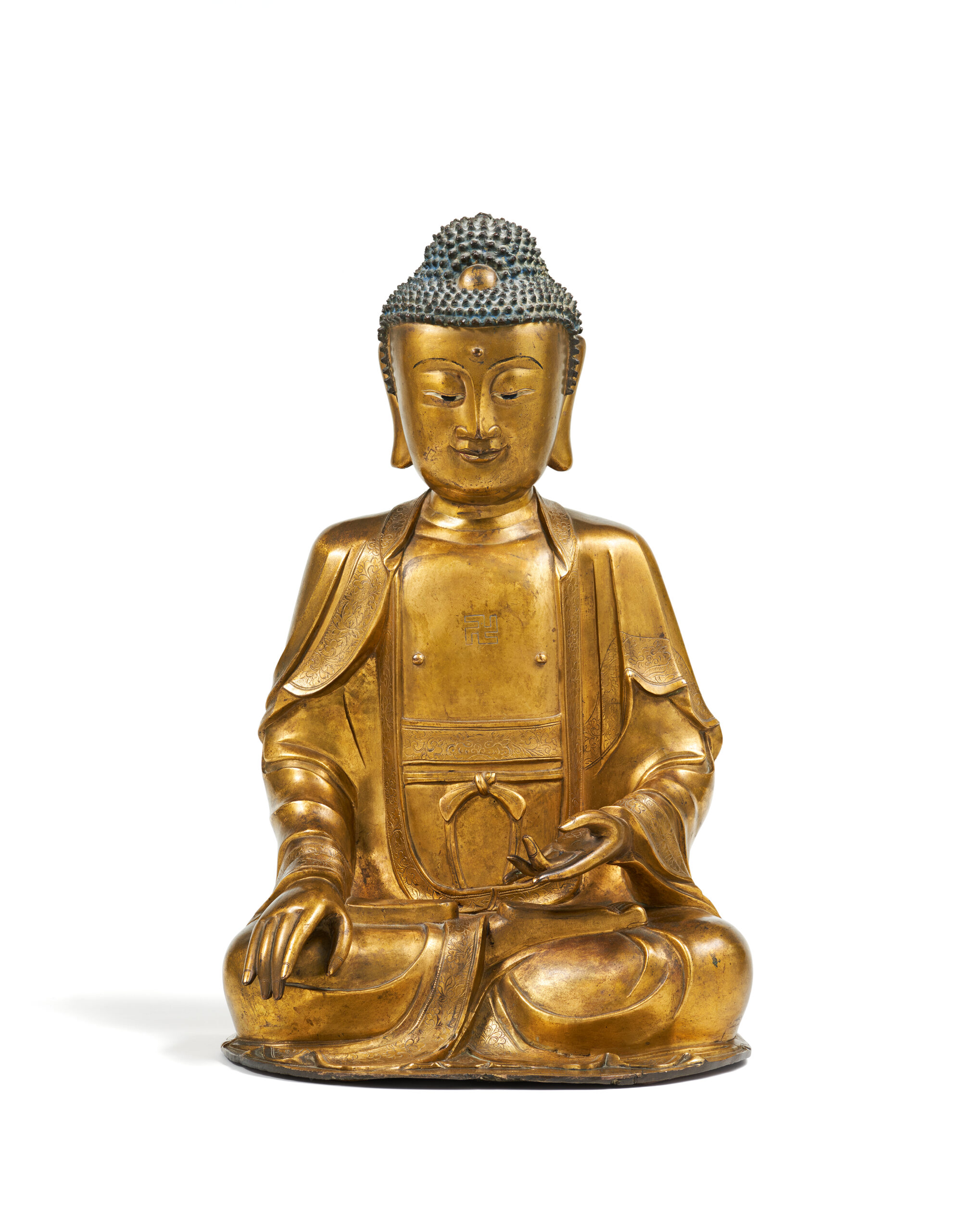 A LARGE GILT-BRONZE FIGURE OF SHAKYAMUNI 17th/18th century Height 50 cm Prov: Private collection, Switzerland Estimate: €100.000 – 150.000,- A LARGE GILT-BRONZE FIGURE OF SHAKYAMUNI 17th/18th century Height 50 cm Prov: Private collection, Switzerland Estimate: €100.000 – 150.000,-