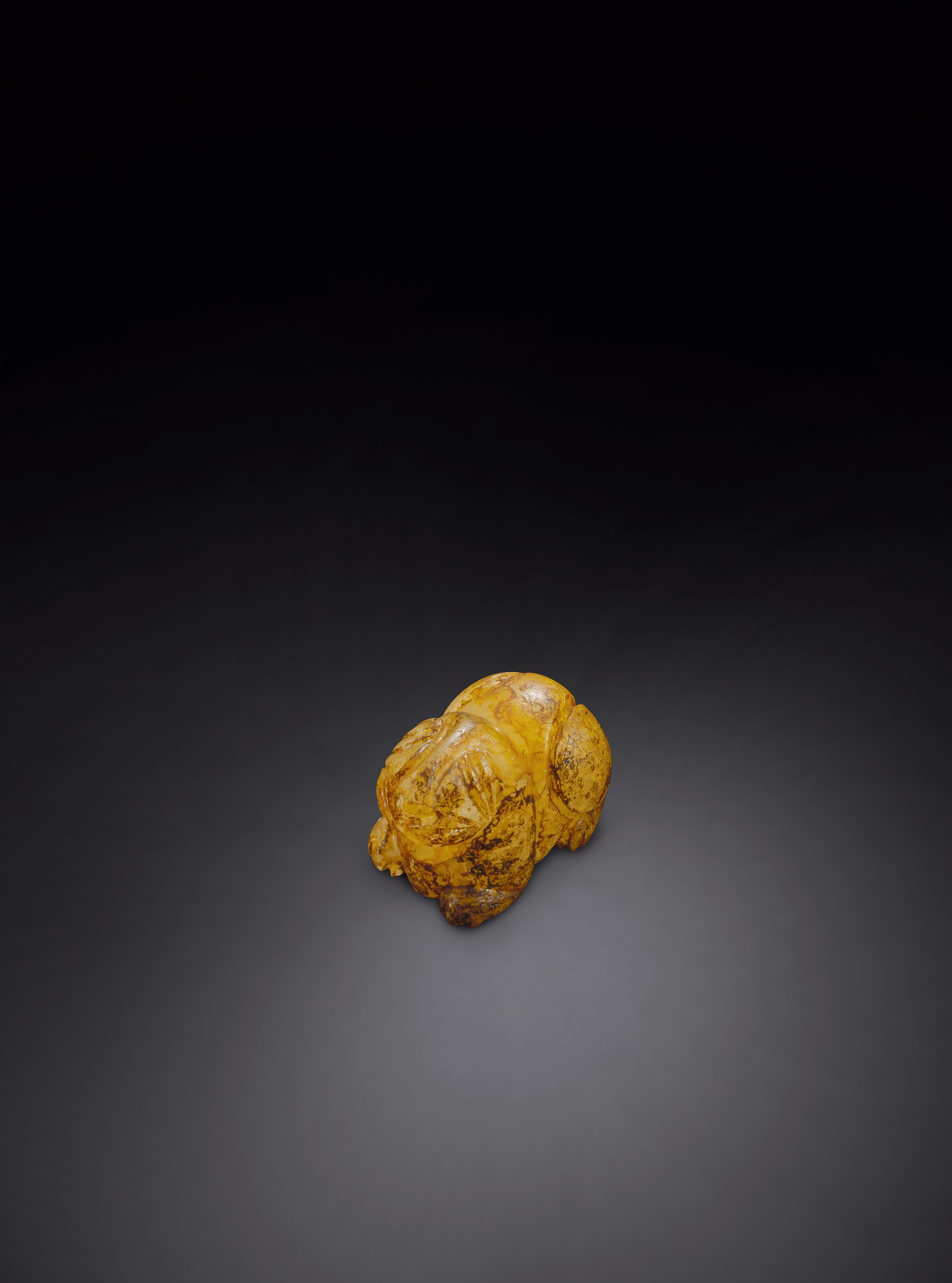 A rock crystal figure of a seated tiger