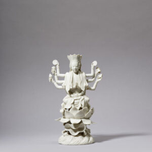 A DEHUA MULTI-ARMED FIGURE OF GUANYIN