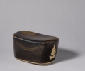 Black Glazed Pillow with Leaf Design