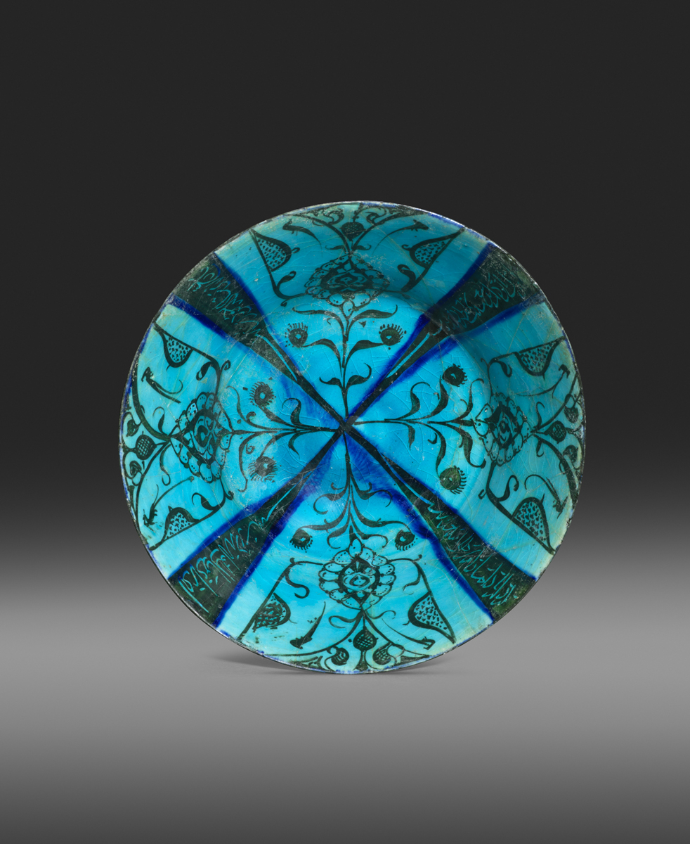 Kashan turquoise-glazed pottery bowl Persia, thirteenth century pottery with glaze, 21.5 cm. diameter Kashan turquoise-glazed pottery bowl Persia, thirteenth century pottery with glaze, 21.5 cm. diameter