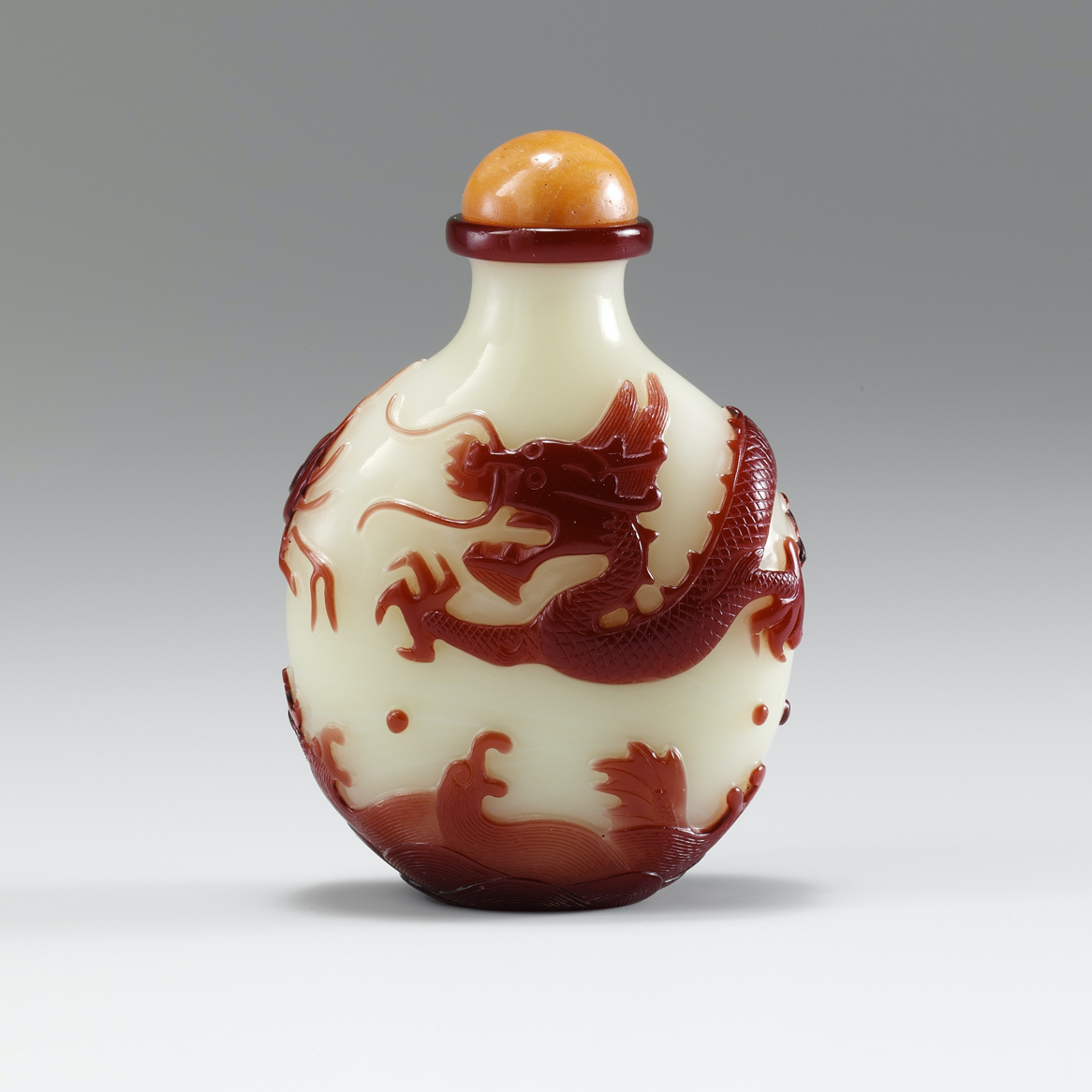Pale yellow glass with red overlay of dragon, 1780-1840