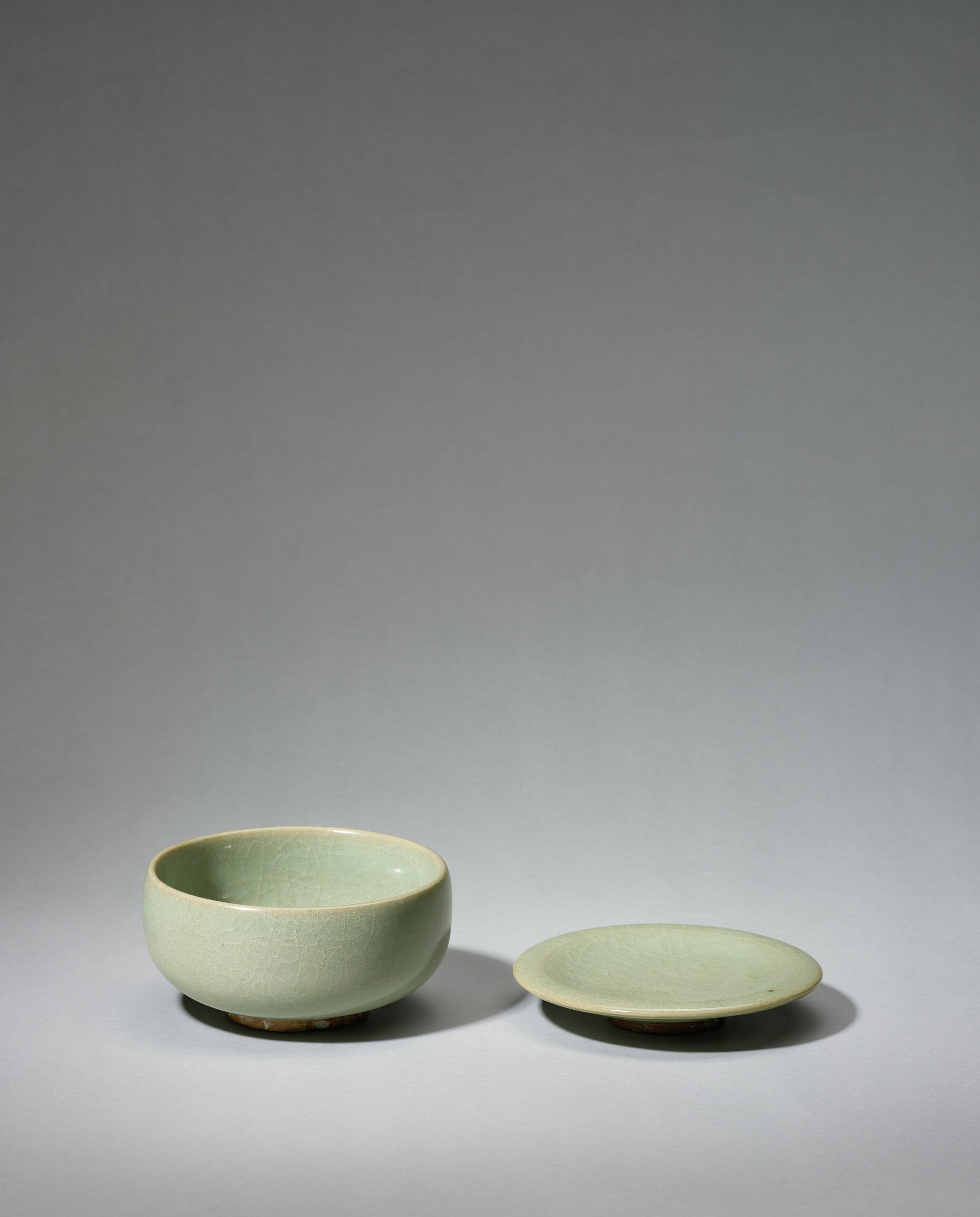 Set of greenish-glazed bowl and dish
