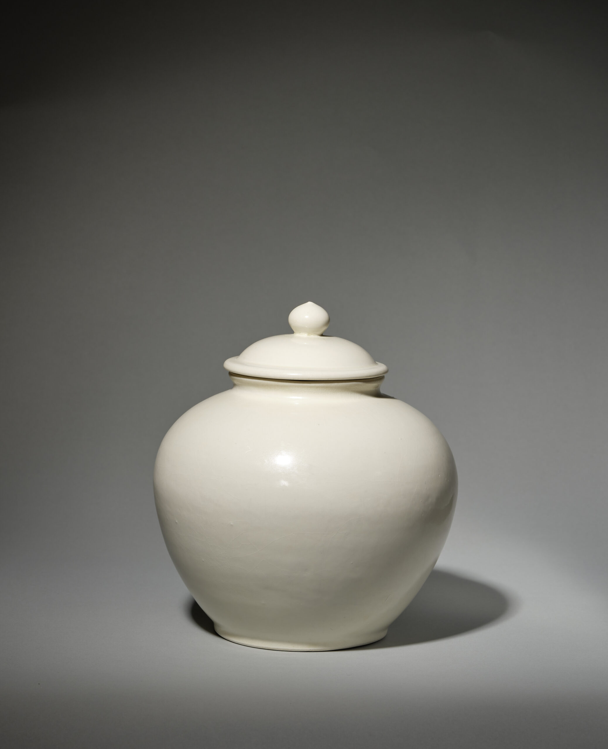 White glazed jar with cover