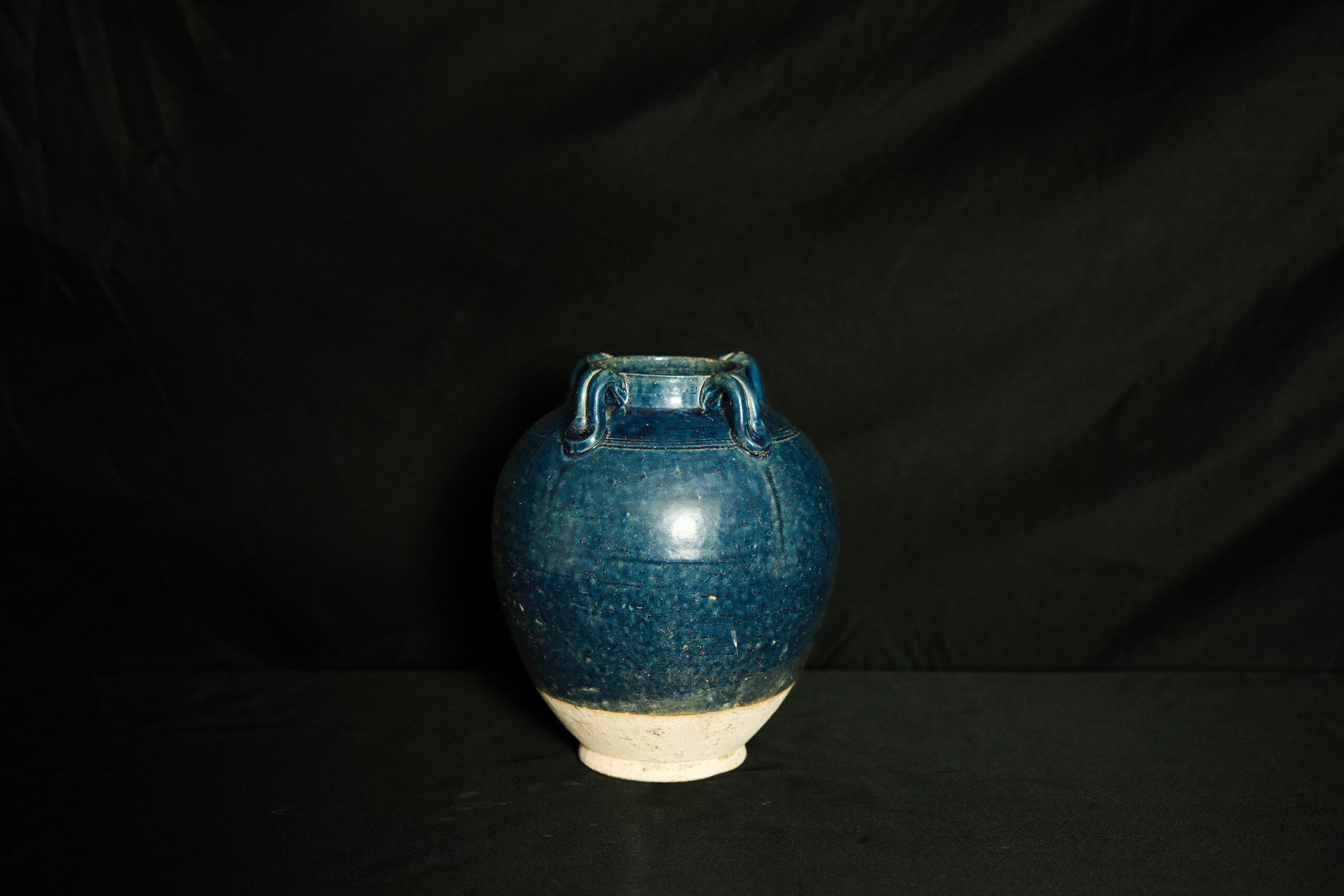 Large white glazed amphora with two dragon handles