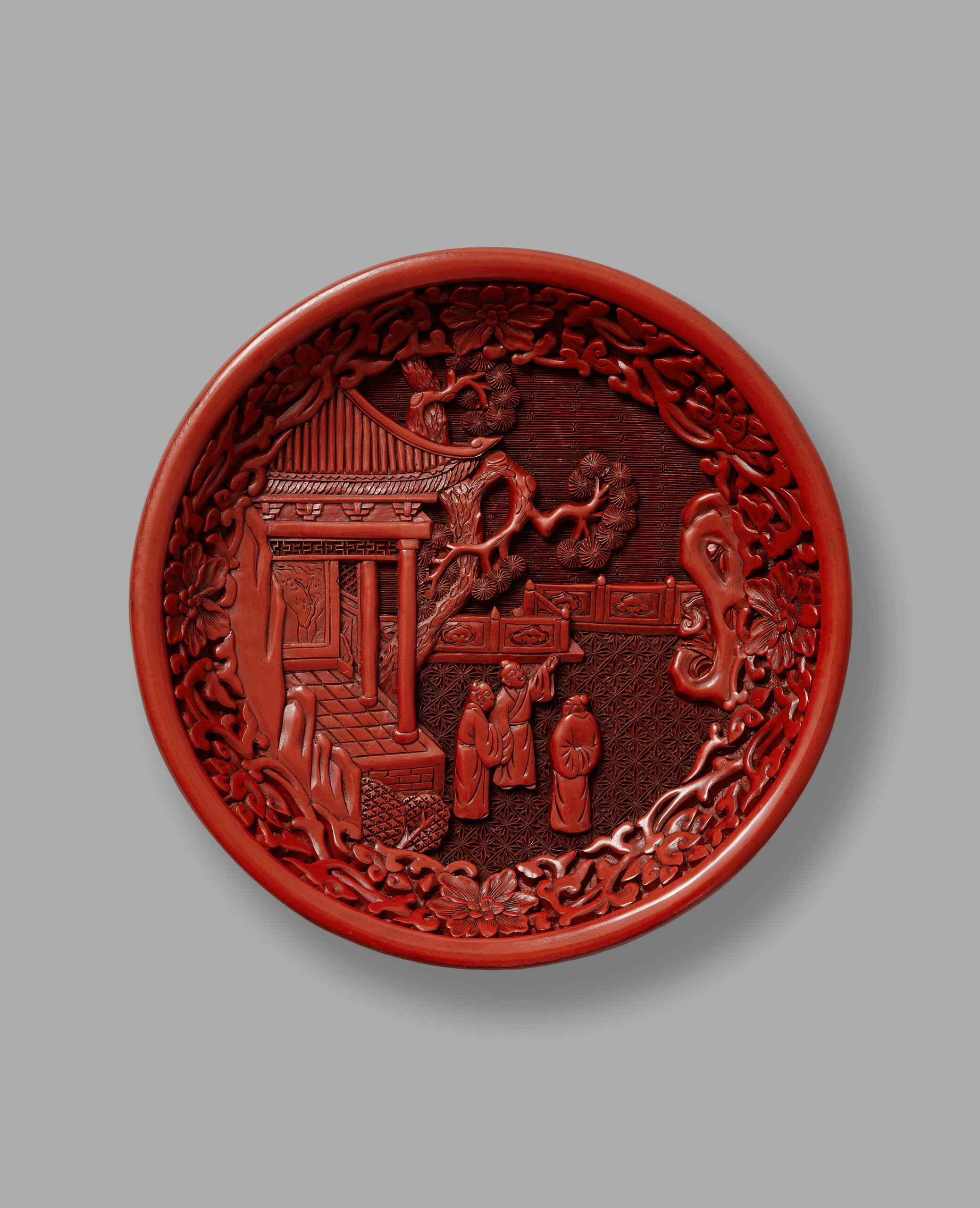 A small and rare red lacquer 'scholars' dish (early Ming Dynasty, Yongle period, 1403-1424)